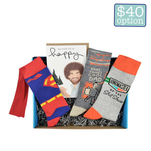 A surprise box with funny, dad themed socks and card