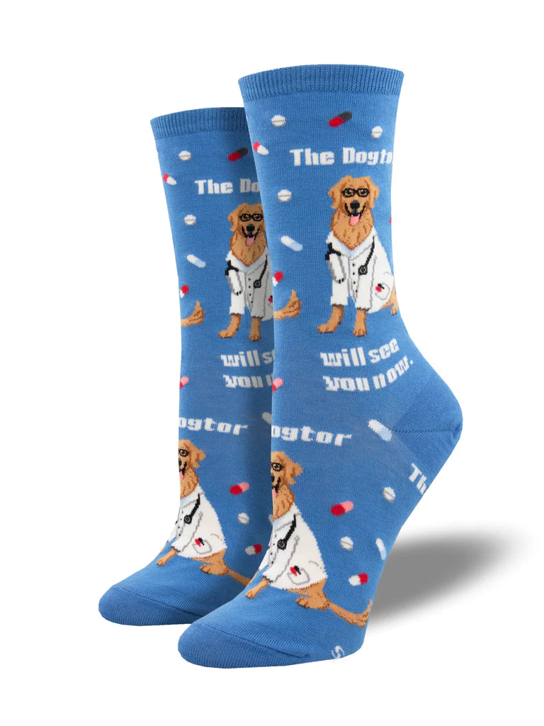 leg forms displaying a pair of sky blue socks featuring a golden retriever wearing a white lab coat and small pills and capsules with the text 