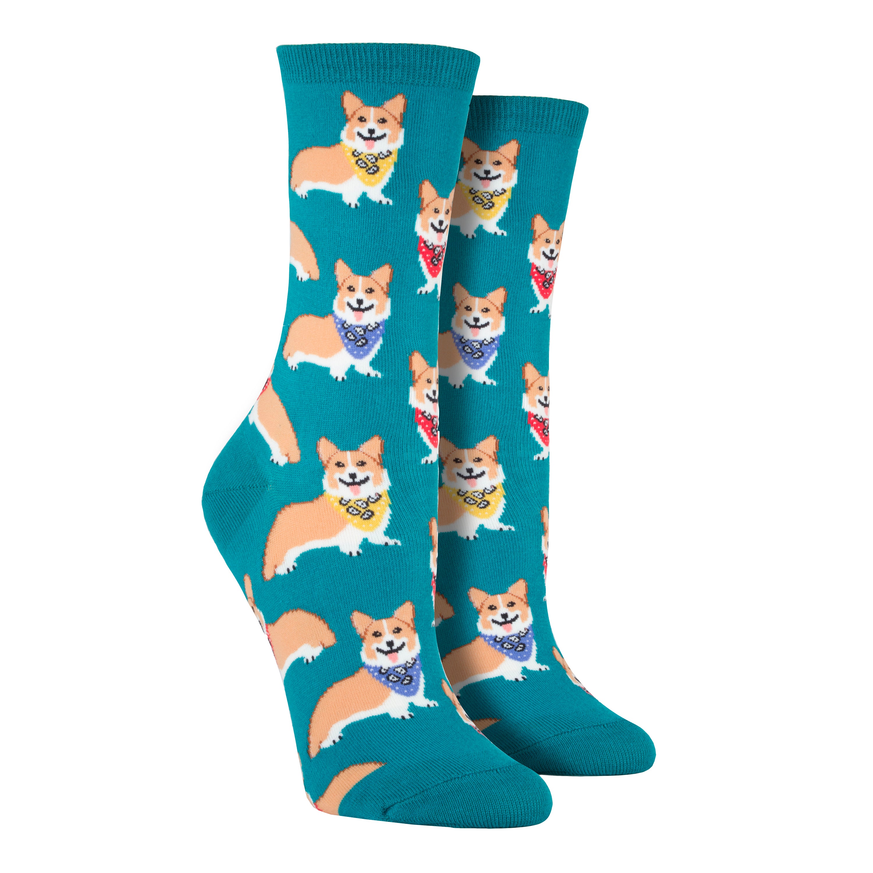 Shown on leg forms, a pair of Sock Smith brand women's cotton crew socks in emerald green featuring an all over motif of blonde corgis in blue, red, and green bandanas.