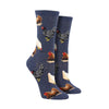 Shown on leg forms, a pair of Socksmith brand women's cotton crew sock in navy with multi-colored hens all over the sock.