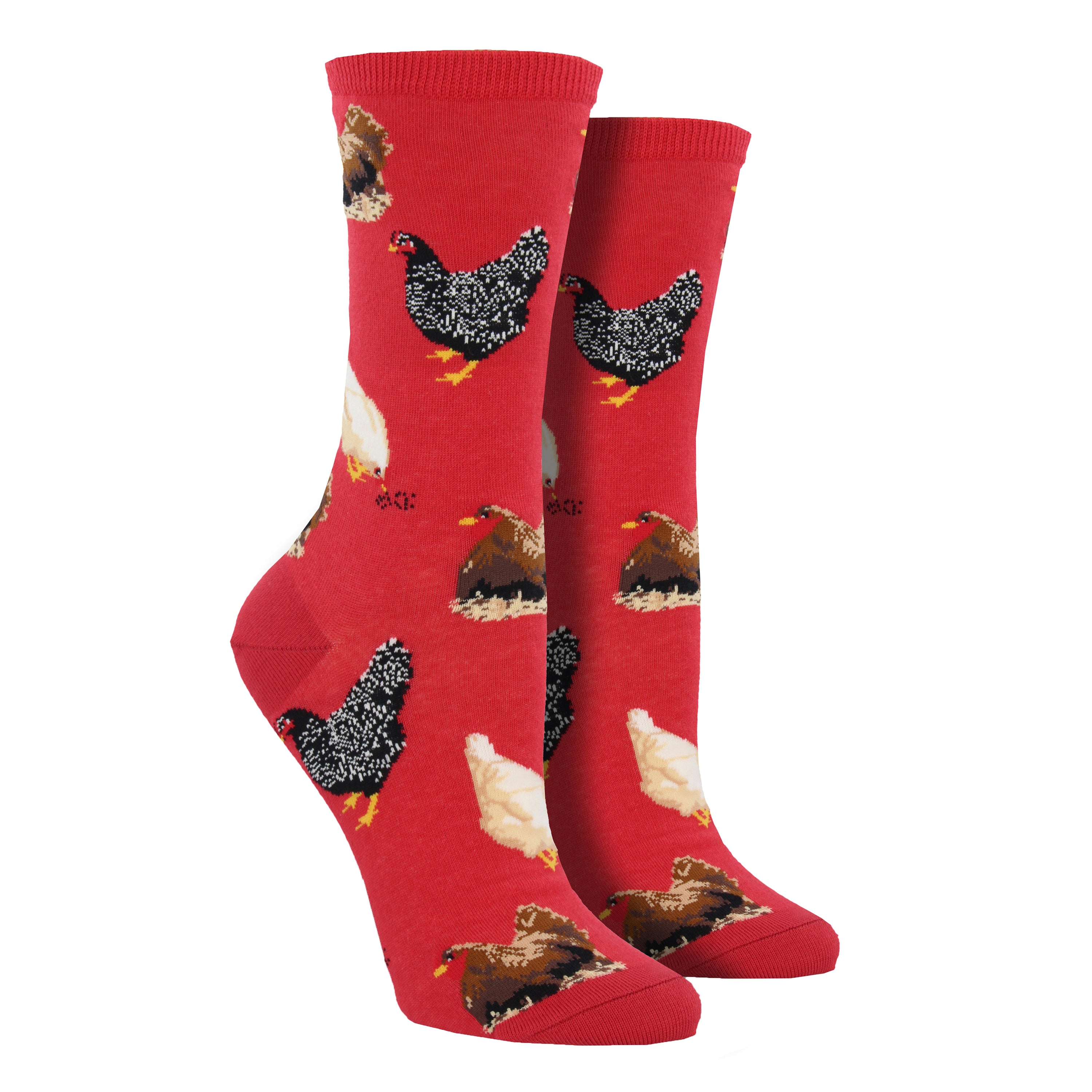 Shown on leg forms, a pair of Socksmith brand women's cotton crew sock in red with multi-colored hens all over the sock.