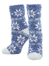 Women's cozy socks in blue with a classic fair isle pattern  shown on leg forms.