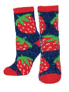 a pair of fuzzy women's socks in navy on foot forms, wth a pattern of oversized red strawberries wth green leaves and a red toe, heel and cuff