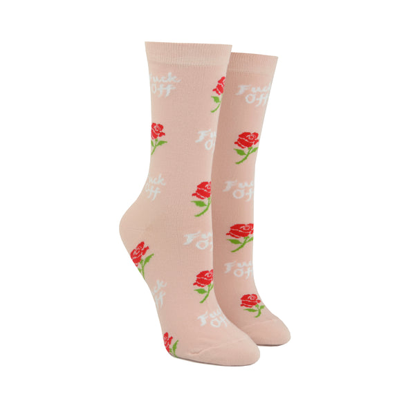 Shown on leg forms, a pair of women's Yellow Owl Workshop pink cotton crew socks with an all over rose and "Fuck Off" motif in white font.