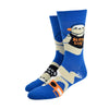 Shown on a foot form from a different angle, a pair of Yellow Owl Workshop’s royal blue nylon-cotton men's crew socks with large sloths listening to music, holding boomboxes and wearing shirts that say “Sloth Life,” “Naps,” “Slow Jams” or “Weekends”
