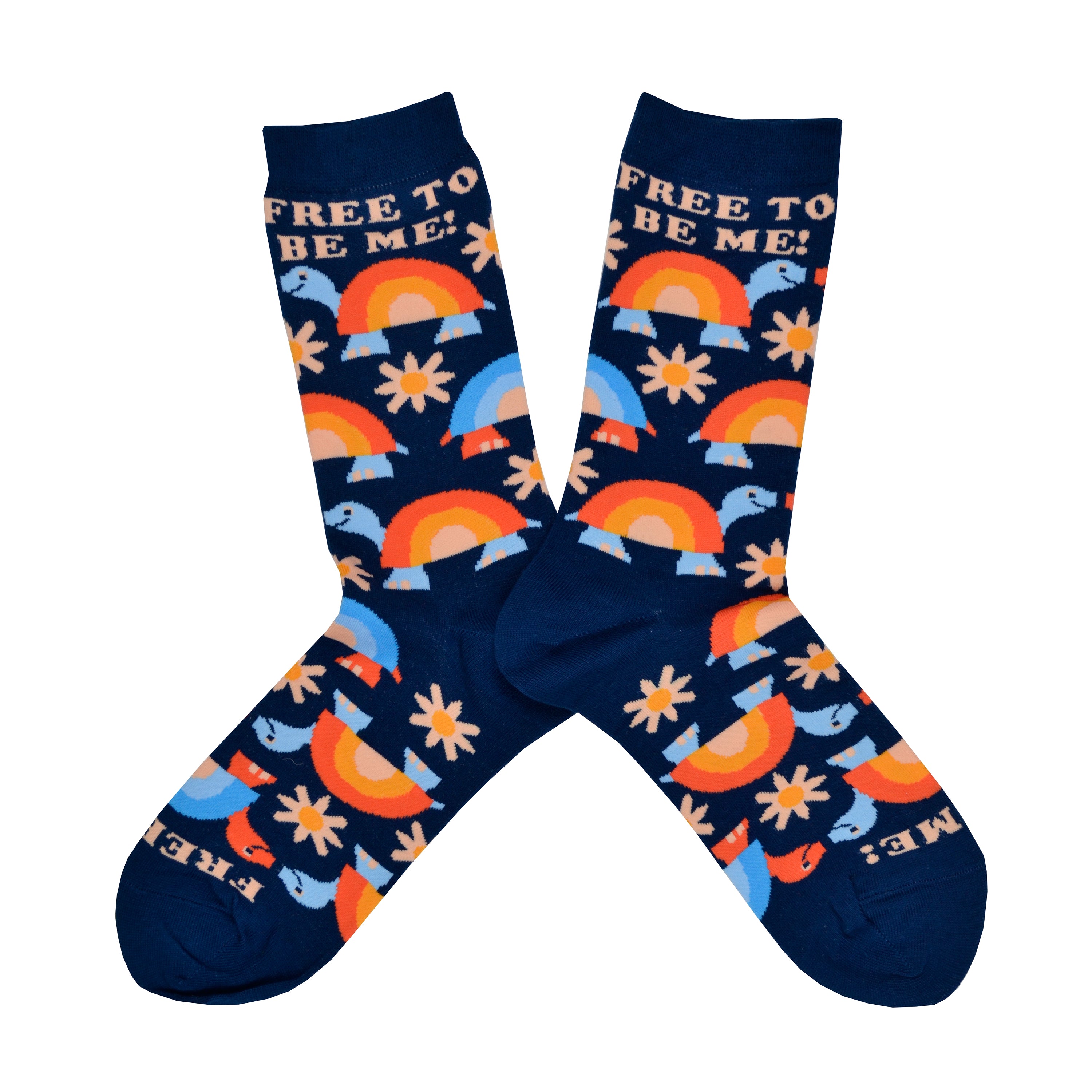 Shown in a flatlay, a pair of women's Yellow Owl Workshop brand cotton and nylon socks in navy blue with orange and blue rainbow shelled turtles and orange daisies and the words 
