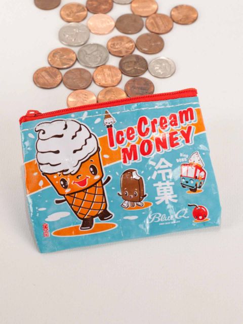 A small aqua coin purse with a red zipper spilling out change on a white background. The purse features cartoon ice cream cones,  an ice cream bar, a cherry, and an ice cream truck. A bold orange strip across the purse features red text that reads, 