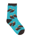 These blue cotton kid's crew socks with a brown heel, toe and cuff by the brand Socksmith feature adorable otters floating in the ocean holding hands.